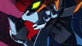 a close up of a robot 's face with a yellow eye