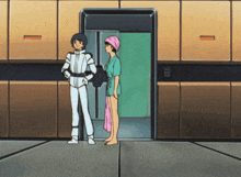 a man in a white suit and a woman in a pink hat are standing next to each other