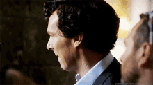 a close up of a man 's face with the words cumsembatchlive tumblr visible
