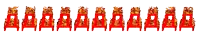 a row of red chairs that are on fire