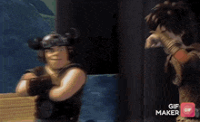 a close up of a person 's face with the words gif maker on the bottom