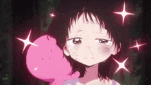 a girl with a pink stuffed animal behind her