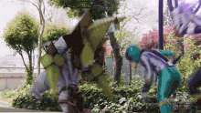 a power rangers advertisement shows a green monster attacking a man in a blue suit
