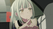 a girl with white hair and brown eyes is making a x sign