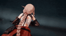 a girl with a gun is laying on the ground