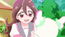 a girl in a pink headband holds a white rabbit