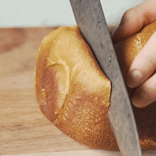 Slicing The Bun Two Plaid Aprons GIF - Slicing The Bun Two Plaid Aprons Cutting The Bread GIFs