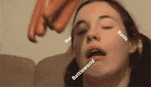 a close up of a woman 's face with the words war raids and battleworld visible