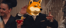 a dog in a suit holds a glass of wine
