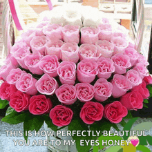 a bunch of pink roses in a basket with a message that says this is how perfectly beautiful you are to my eyes honey