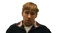 a man wearing a sweater with a red white and blue striped collar