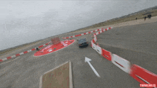 a video of a car on a track with thinki jules written on the bottom right