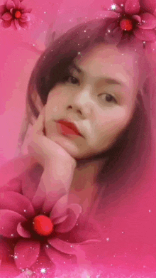 a woman is surrounded by pink flowers and stars