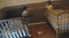 toddlers pulling brother sister closer