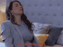 a woman laying on a bed with the words lisathoughts written in red
