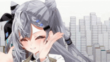 a girl with gray hair is smiling and making a face