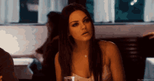 The Not Bad Squint And Nod GIF - Mila Kunis GIFs