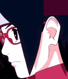 a close up of a cartoon character wearing glasses and a red shirt .