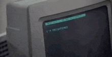 a close up of an old computer monitor with the words `` i 'm frightened '' on the screen .