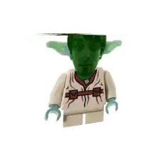 a lego figure has a green face and a white shirt
