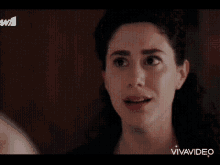 a close up of a woman 's face with the word vivavideo at the bottom of the screen