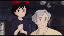 a girl with a red bow on her head stands next to an older woman with gray hair