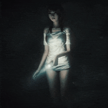 a woman in a white dress holds a flashlight in her hand