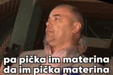 a man in a suit with the words pa picka im materna da im picka materna