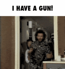a man holding a gun with the words i have a gun behind him
