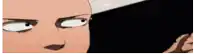 a close up of a bald man 's face with a serious look on his face .