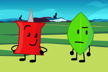 a red pin and a green leaf standing next to each other in a field