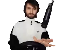 a man with a beard is holding a steering wheel in his hands