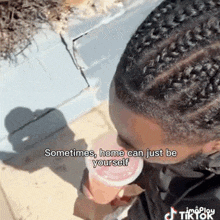 a man drinking from a cup that says sometimes home can just be yourself on it