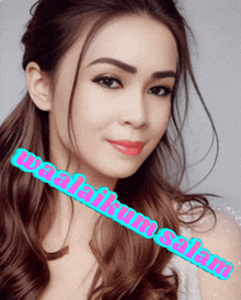 a woman 's face is displayed next to a message that says ' selamat '