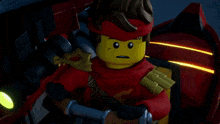 a lego ninjago character holding a sword with the letter s on his chest