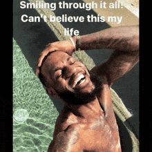 a shirtless man is smiling by a pool with the caption smiling through it all