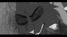 a black and white photo of a cartoon character