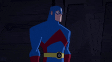 a cartoon character in a blue and red superhero costume with an atom on his cape