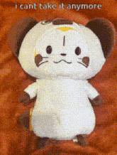 a stuffed animal with the words " i cant take it anymore " on it