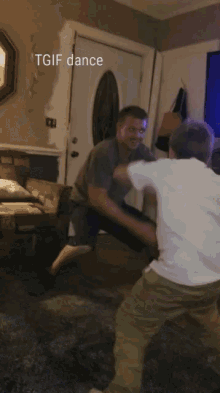 two men are dancing in a living room and the caption says tgif dance
