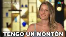 a woman says " tengo un monton " in a foreign language