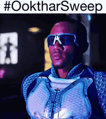 a picture of a man wearing sunglasses with the hashtag #ooktharsweep above him