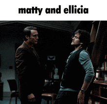 two men are standing next to each other with the words matty and elicia above them