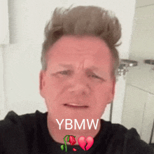 a man with a broken heart and the word ybmw written on his face