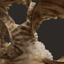 a spiral staircase with a black background and a few steps