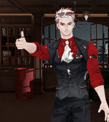 a man in a suit giving a thumbs up sign