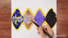 a person is painting with a brush and the words made in animotica are visible
