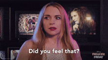 a woman says did you feel that in front of a disney freakier friday poster