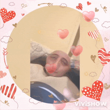 a picture of a person with hearts around them and the words vivishow on the bottom right