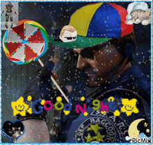 a man wearing a colorful hat and sunglasses is holding a lollipop and says goodnight